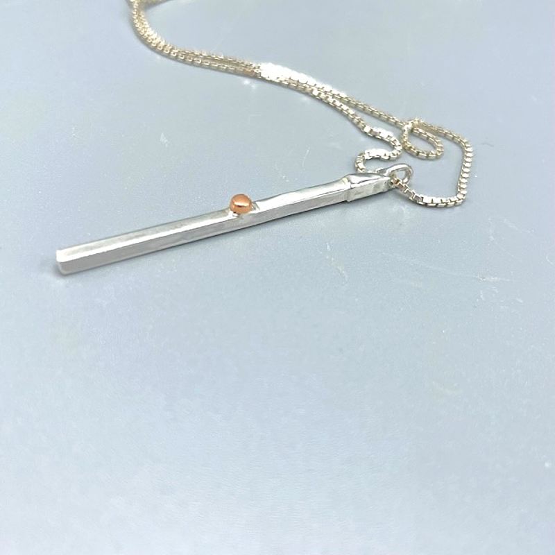 Stilrent set med guldcylindrar