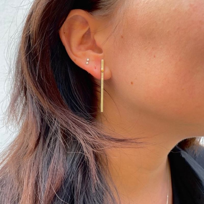 Stilrent set med guldcylindrar