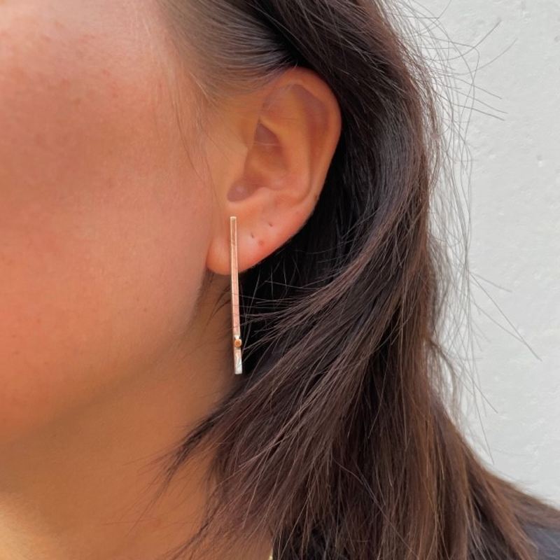 Stilrent set med guldcylindrar