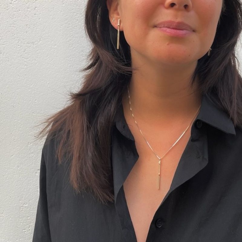 Stilrent set med guldcylindrar