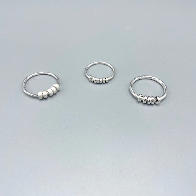 Antistressring med Snurrbara Ringar – Handgjord i Sterlingsilver